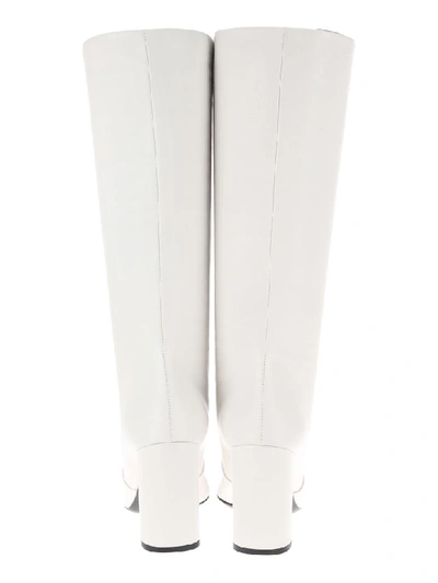 Shop Prada Knee High Boots In White