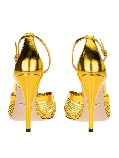 Shop Gucci Metallic Leather Sandal In Gold
