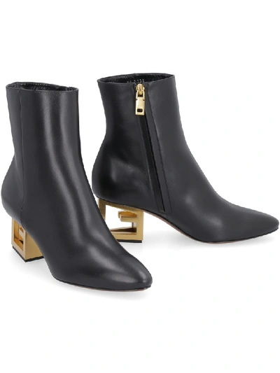 Shop Givenchy Triangle Leather Pointy-toe Ankle-boots In Black