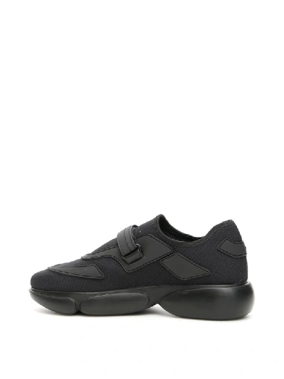 Shop Prada Cloudbust Sneakers In Nero (black)