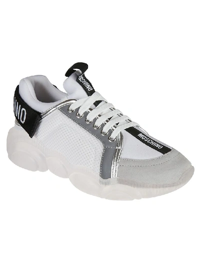 Shop Moschino Logo Sneakers In White