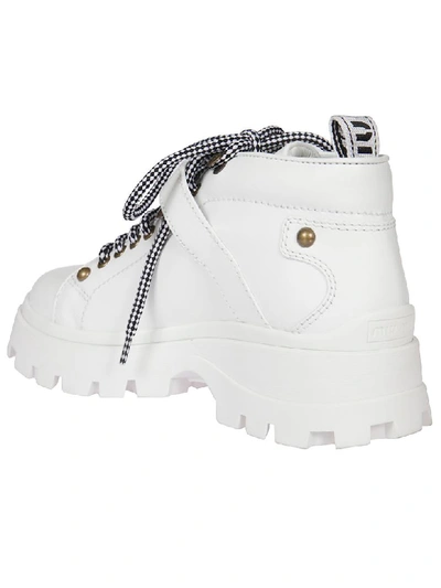 Shop Miu Miu Ridged Sole Biker Boots In White