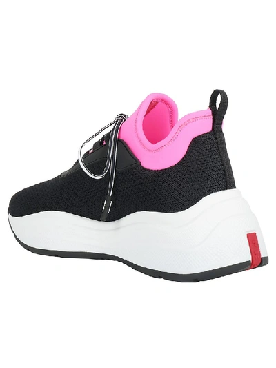 Shop Prada Americas Cup Sneakers In Nero+rosa Fluo