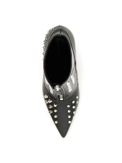 Shop Alexander Mcqueen Studded Booties In Black Silver (black)