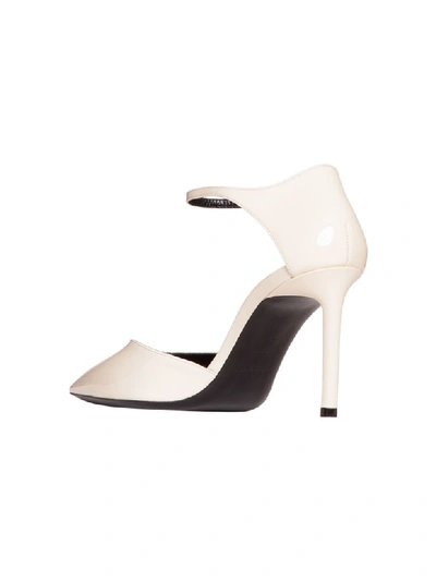 Shop Saint Laurent Anja 85 Pointed-toe Pumps In Panna