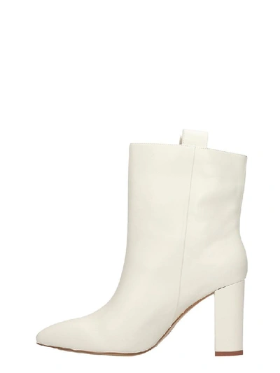 Shop Bibi Lou High Heels Ankle Boots In White Leather