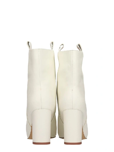 Shop Bibi Lou High Heels Ankle Boots In White Leather