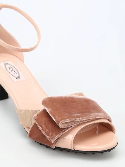 Shop Tod's Pink Sandals With Velvet Bow