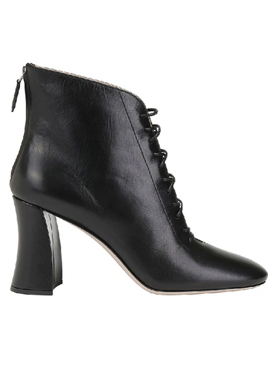 Shop Miu Miu Ankle Boots In Nero