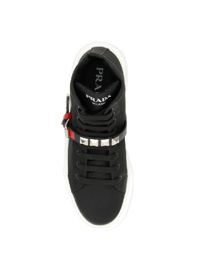 Shop Prada Nylon Sneakers With Studded Strap In Nero Fuoco (black)