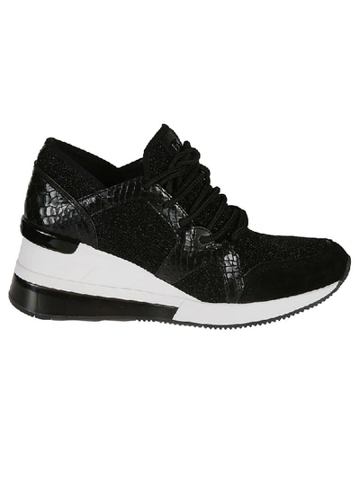 Shop Michael Kors Liv Trainer Extreme Sneakers In Black