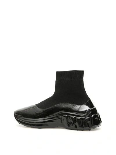 Shop Miu Miu Miu Run Sneakers In Nero (black)