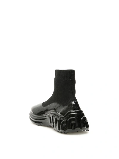 Shop Miu Miu Miu Run Sneakers In Nero (black)