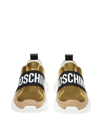 Shop Moschino Slip On Teddy Run In Gold Laminated Leather