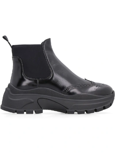 Shop Prada Leather Chelsea Boots In Black