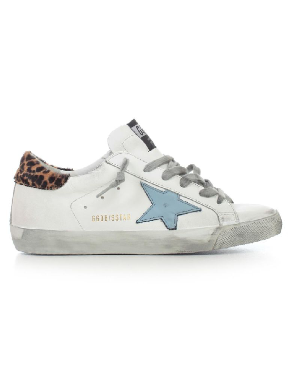 golden goose with blue star