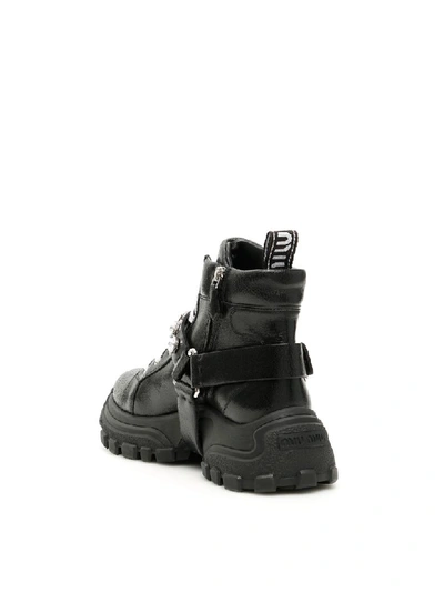 Shop Miu Miu Crackled Combat Sneakers In Nero (black)