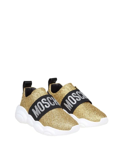 Shop Moschino Teddy Sneakers In Glitter Gold Color