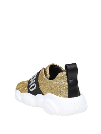 Shop Moschino Teddy Sneakers In Glitter Gold Color