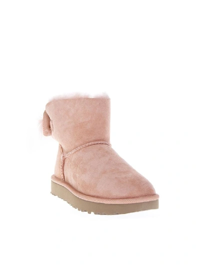 Shop Ugg Fluff Pink Mini Boots