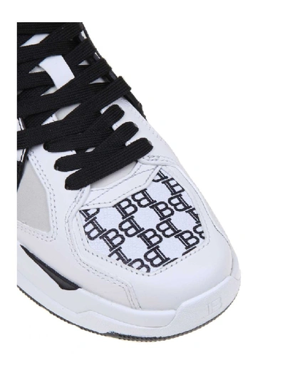 Shop Balmain B-ball Sneakers In White / Black Leather In White/black