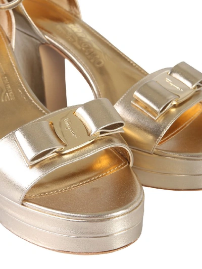 Shop Ferragamo Eclipse Sandals In Oro