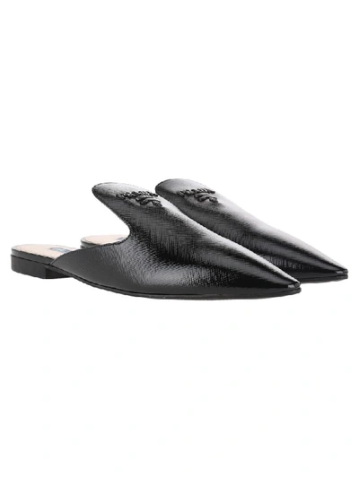 Shop Prada Flat Leather Mules With Logo In Black