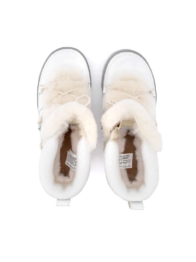 Shop Ugg Highland White Leather, Rubber And Sheepskin Ankle Boots. In Bianco