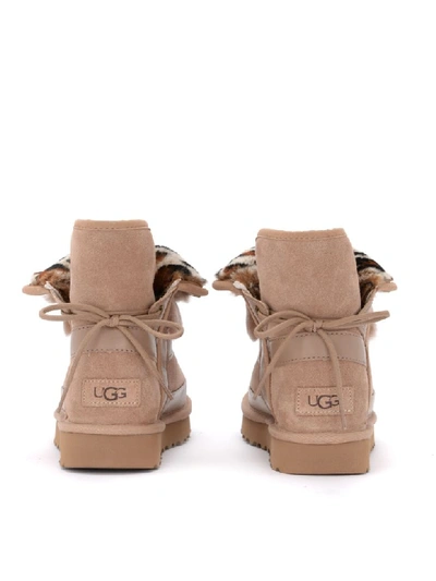 Shop Ugg Classic Leopard Lined Bow Ankle Boot In Beige Suede.