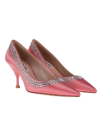 Shop Miu Miu Crystal Embellished Pumps In Pink