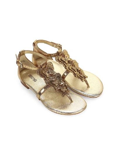 Shop Michael Kors Felicity Pale Gold Thong Sandal In Pale Gold (gold)