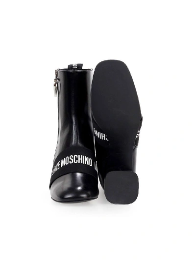 Shop Love Moschino Black Leather Logo Ankle Boot In Nero (black)