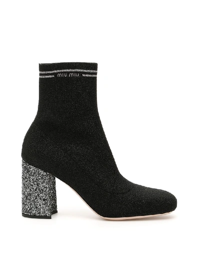 Shop Miu Miu Glitter Sock Booties In Nero Cromo (black)
