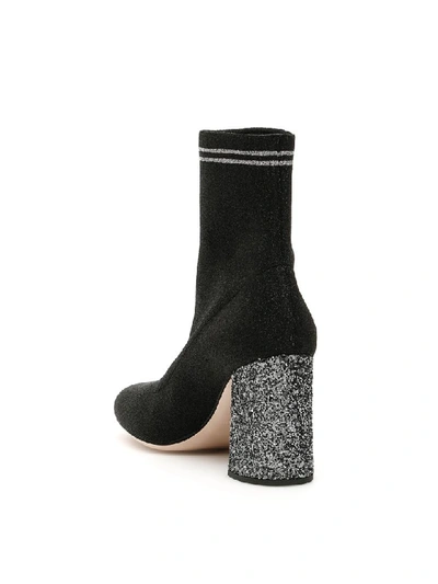 Shop Miu Miu Glitter Sock Booties In Nero Cromo (black)