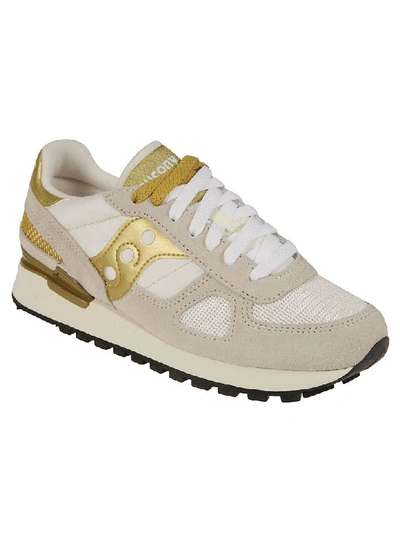 Shop Saucony Paneled Sneakers In White/gold