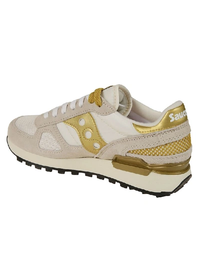 Shop Saucony Paneled Sneakers In White/gold
