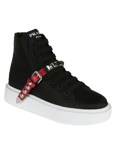 Shop Prada Studded Hi-top Sneakers In Black