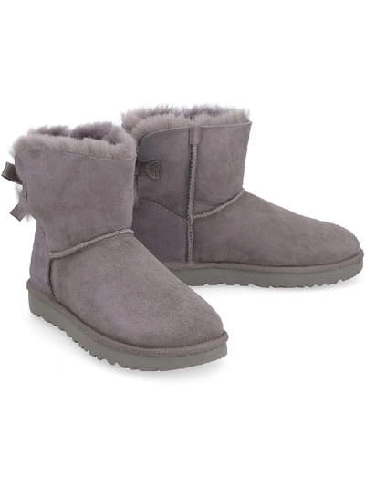 Shop Ugg Mini Bailey Bow Ii Ankle Boots In Grey