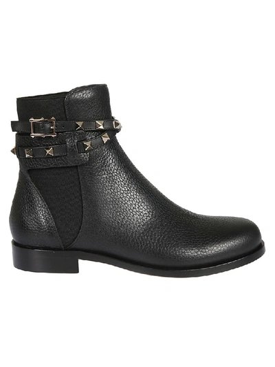 Shop Valentino Studded Ankle Boots In Black
