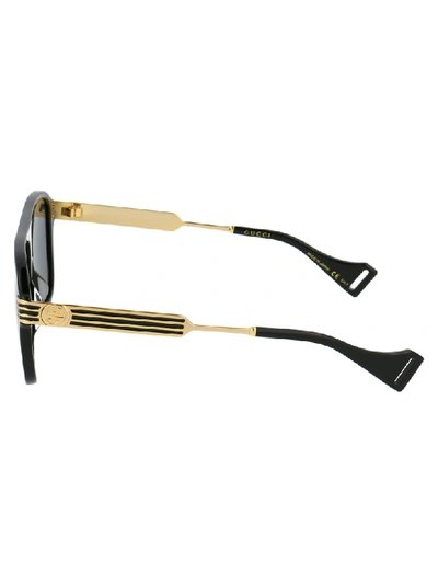 Shop Gucci Sunglasses In Black Gold Grey