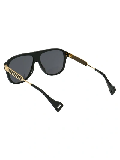 Shop Gucci Sunglasses In Black Gold Grey