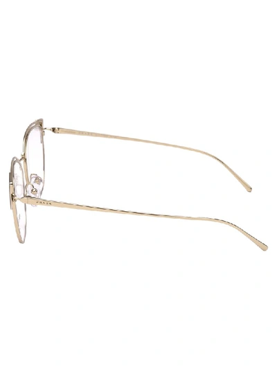 Shop Prada Glasses In Grey/pale Gold