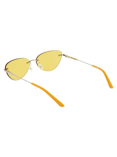 Shop Calvin Klein Sunglasses In Yellow