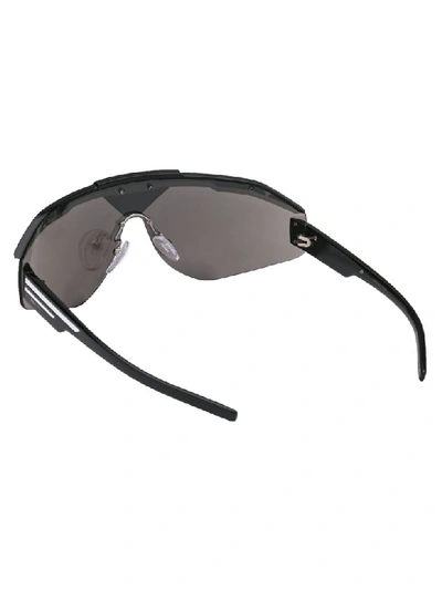 Shop Prada Sunglasses In Black