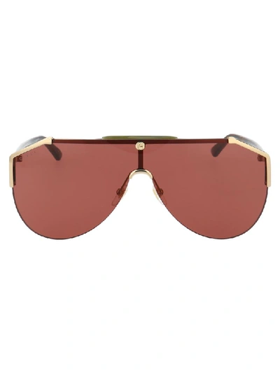 Shop Gucci Sunglasses In Gold Havana Red
