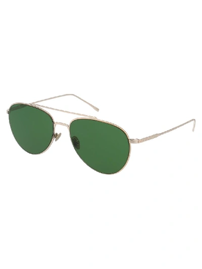 Shop Lacoste Sunglasses In Gold