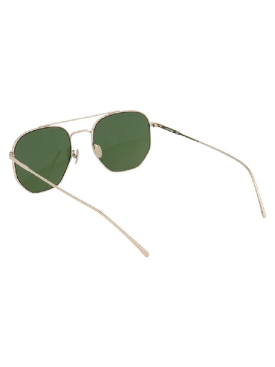 Shop Lacoste Sunglasses In Shiny Gold