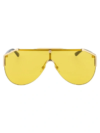 Shop Gucci Sunglasses In Gold Black Yellow