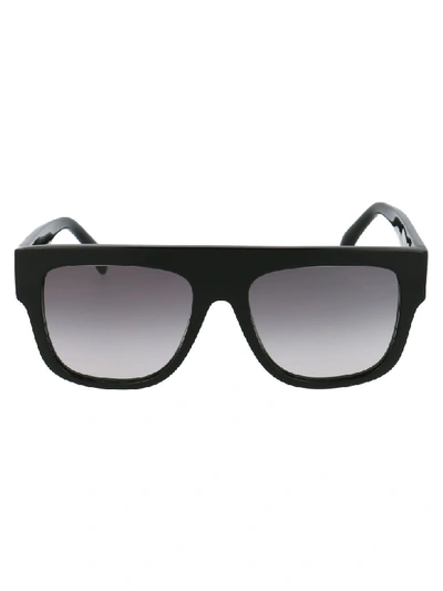 Shop Alaïa Sunglasses In Black Black Grey