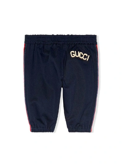 Shop Gucci Blue Newborn Trousers